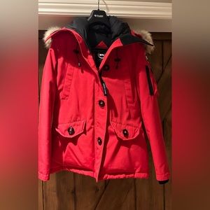 Size medium, red Canada Goose, hip length winter jacket. Used like new